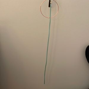 New baby blue shiny belt, 40 inches long; 0.25 inches wide